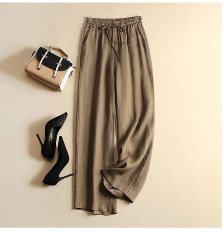 Manon Statement Linen Pants In Brown - flat-lay product shot with bag and heels - Miss Mosa By Akanksha