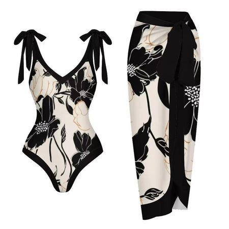Maree Swimsuit With Sarong In Black - flat-lay product shot of swimsuit and sarong - Miss Mosa By Akanksha