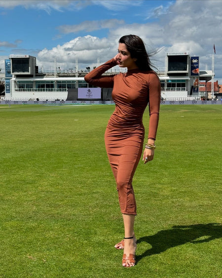 Mariam Luxe Pleated Maxi Dress - lifestyle shot on model, brown - Miss Mosa By Akanksha