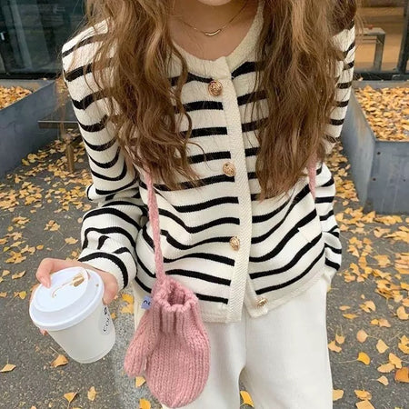 Marietta Striped Woolen Cardigan - front shot on model outdoors, cream and black - Miss Mosa By Akanksha