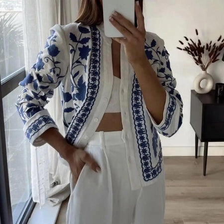 Marlin Embroidered Summer Top In White - front shot on model holding phone - Miss Mosa By Akanksha