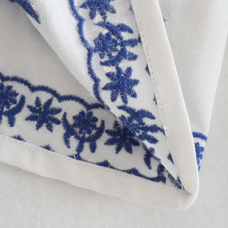 Marlin Embroidered Summer Top In White - close-up of hem embroidery detail - Miss Mosa By Akanksha