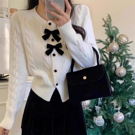 Maya Cute Woolen Sweater with Bow Detail - front shot on model in mirror, white - Miss Mosa By Akanksha