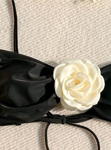 Meloe Rosette Summer Bikini In Black - close-up shot of the rosette bikini top - Miss Mosa By Akanksha