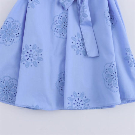 Melon Summer Eyelet Cotton Dress In Blue - close-up of skirt hem and belt detail - Miss Mosa By Akanksha