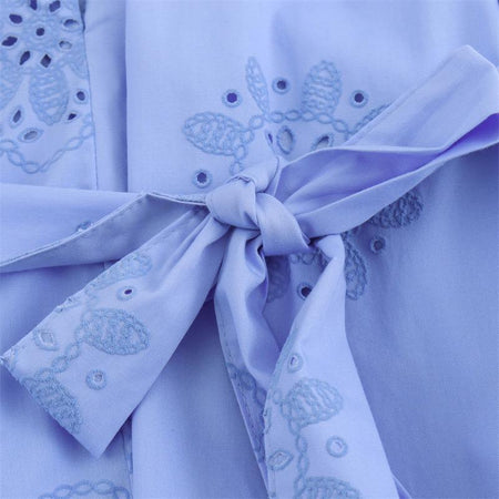 Melon Summer Eyelet Cotton Dress In Blue - close-up of waist tie bow detail - Miss Mosa By Akanksha