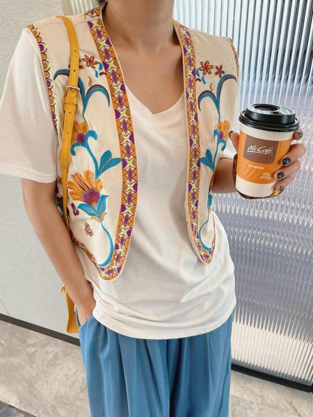 Mera Statement Vest Top In Beige - front shot on model worn over t-shirt - Miss Mosa By Akanksha