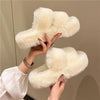 Mia Cute Fuzzy Slippers in Off White - close-up of slippers held in hand - Miss Mosa By Akanksha