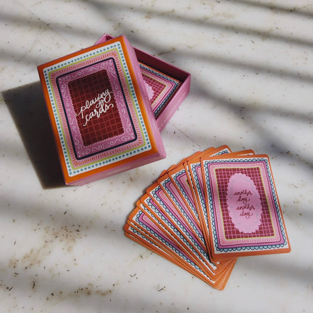 Miss Mosa Playing Cards- Diwali Edition - flat-lay shot of box and fanned cards, multicolour pink and orange - Miss Mosa By Akanksha