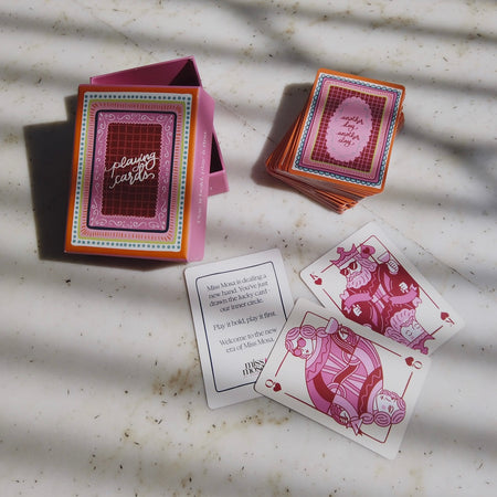 Miss Mosa Playing Cards- Diwali Edition - flat-lay shot of box and cards with face cards, multicolour pink and maroon - Miss Mosa By Akanksha