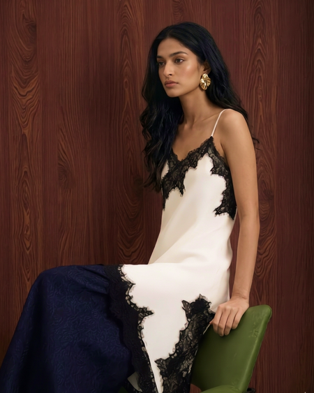 Myra Lace Mini Dress - seated shot, cream with black lace trim - Miss Mosa By Akanksha