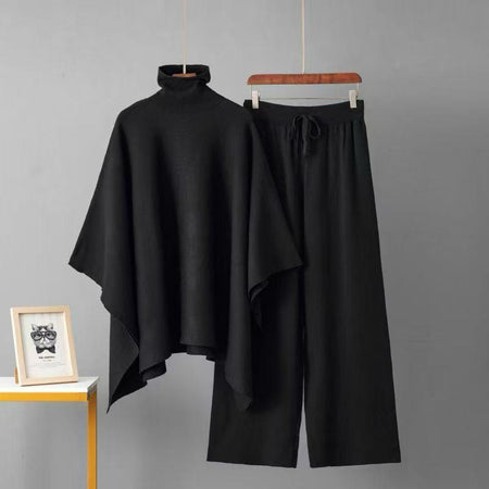 Natalia Luxe Winter Coord Set In Black - flat-lay shot of cape and trousers on hanger - Miss Mosa By Akanksha
