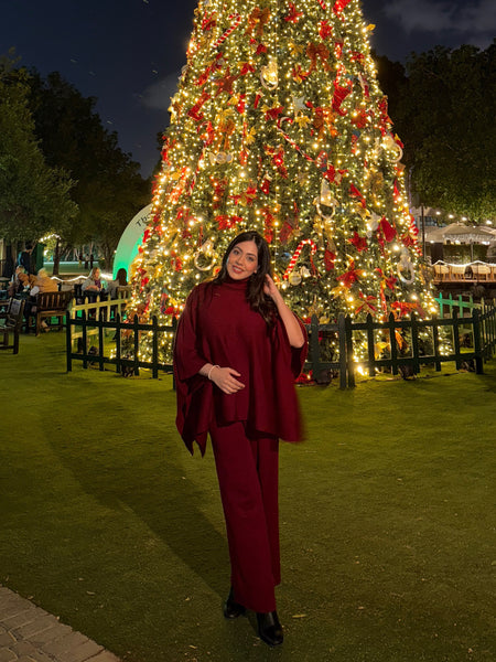 Natalia Luxe Winter Coord Set In Maroon - full-length shot on model by Christmas tree - Miss Mosa By Akanksha