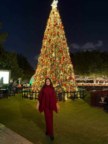 Natalia Luxe Winter Coord Set In Maroon - full-length shot on model by Christmas tree - Miss Mosa By Akanksha
