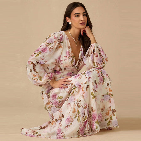 Nelia Floral Maxi Dress - seated shot, pink and lilac floral on cream - Miss Mosa By Akanksha