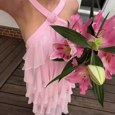 Nitsy Ruffled Maxi Dress In Pink - close-up shot on model holding lilies - Miss Mosa By Akanksha