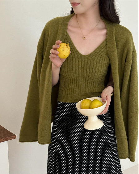Nixie Statement Woolen Tops with Cape Style Sweater - front shot on model with fruit, olive green - Miss Mosa By Akanksha
