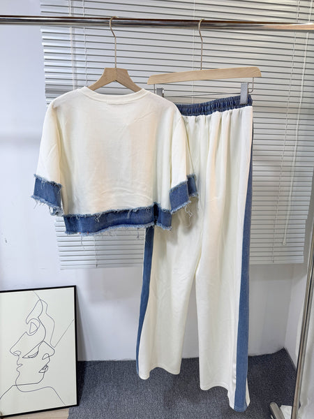 Noemi Knitted Soft Denim Co-ord Set In White - back hanging product shot of co-ord top and trousers - Miss Mosa By Akanksha