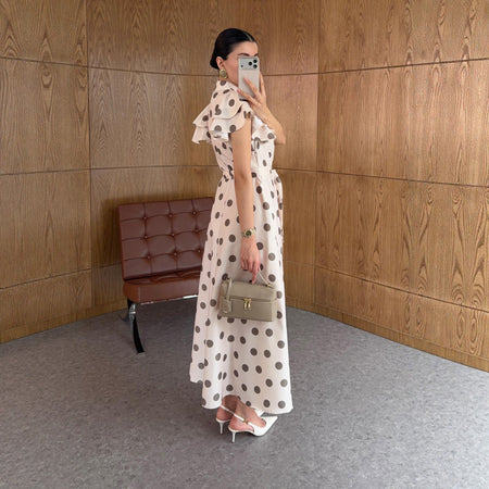 Noemie Ruffle Polka Maxi Dress - side full-length shot, cream with brown polka dots - Miss Mosa By Akanksha