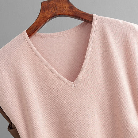 Norie Knit Summer Top In Peach - close-up shot of neckline on hanger - Miss Mosa By Akanksha