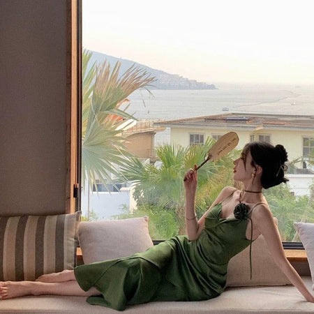 Olive Rosette Midi Dress In Olive - reclining shot on model - Miss Mosa By Akanksha