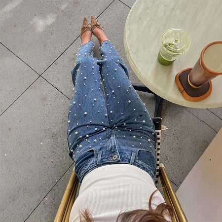 Orca Pearl Denim Jeans In Navy Blue - close-up shot of pearl detail on model - Miss Mosa By Akanksha