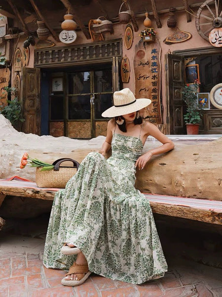 Oriana Summer Holiday Dress - seated shot on model outdoors, green and cream - Miss Mosa By Akanksha