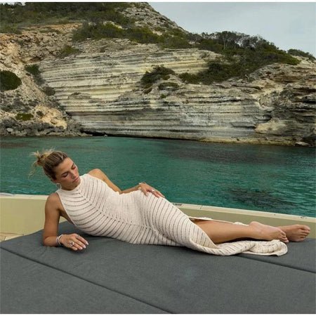 Orit Luxe Soft Knit Dress- Resortwear - styling shot on model on boat, cream - Miss Mosa By Akanksha