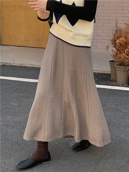 Paola Statement Woolen Pleated Skirt - side shot on model, taupe - Miss Mosa By Akanksha