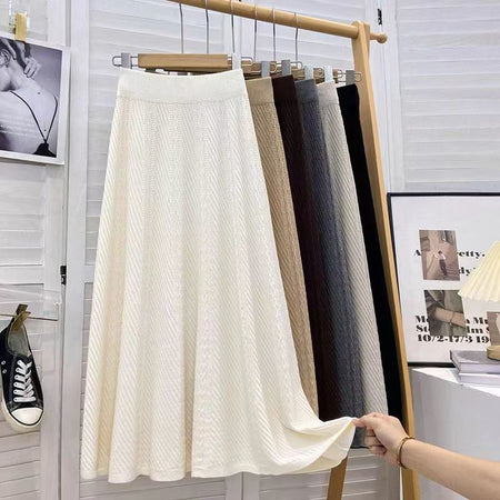 Paola Statement Woolen Pleated Skirt - product shot on hanger rail, off-white - Miss Mosa By Akanksha