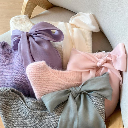 Pierre Premium Bow Sweater - flat-lay grouped shot, lilac, pink, grey and cream - Miss Mosa By Akanksha