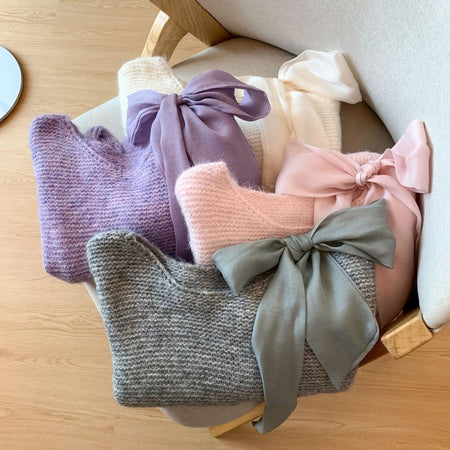 Pierre Premium Bow Sweater - flat-lay grouped shot, lilac, pink, grey and cream - Miss Mosa By Akanksha
