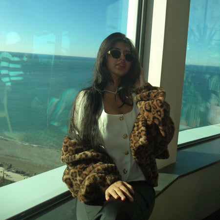 Premium Leopard Soft Fur Jacket - side shot on model indoors, leopard print - Miss Mosa By Akanksha