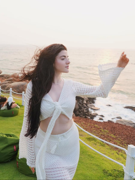 Raya Soft Knot Crochet Coord Set In White - side shot on model by the sea - Miss Mosa By Akanksha