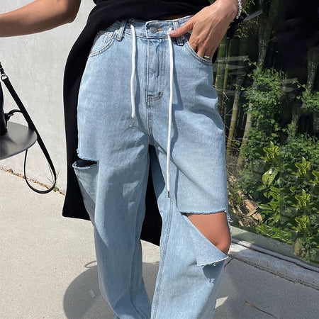 Riba Cropped Statement Denim Jeans - close-up front shot, waist down, light blue - Miss Mosa By Akanksha