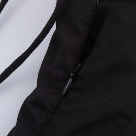 Rima Summer Statement Top - close-up of side zip detail, black - Miss Mosa By Akanksha