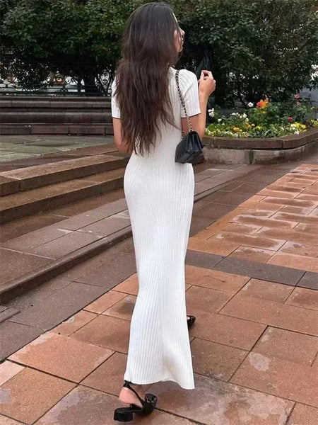 Rimona Luxe Soft Knit Dress - back shot on model outdoors, white - Miss Mosa By Akanksha