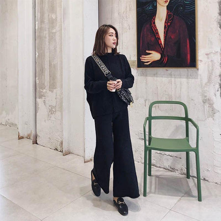 Robbie statement Tracksuit - full-length shot on model, black - Miss Mosa By Akanksha