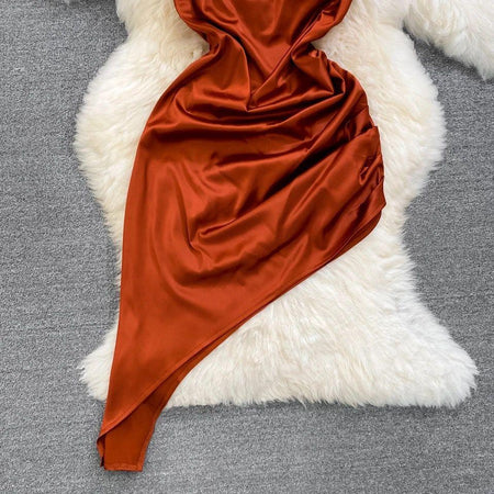 Rory Luxury Satin Dress - close-up of asymmetric hem, rust - Miss Mosa By Akanksha