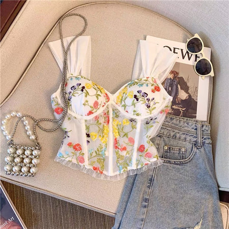 Rosie Embroidered Crop Top In White - flat-lay product shot styled with accessories - Miss Mosa By Akanksha