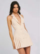 Ruby Luxe Backless Pleated Mini Dress - front shot on model, cream - Miss Mosa By Akanksha