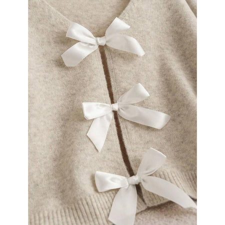 Rylee Bow Oversized Cardigan In Beige - back shot on model showing bow detail - Miss Mosa By Akanksha