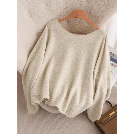 Rylee Bow Oversized Cardigan In Beige - back shot of the sweater on hanger - Miss Mosa By Akanksha