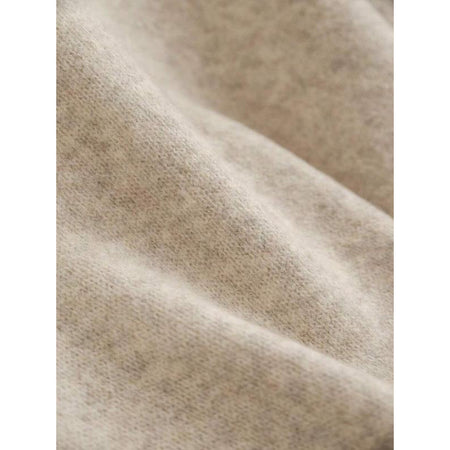 Rylee Bow Oversized Cardigan In Beige - close-up of the knit fabric detail - Miss Mosa By Akanksha