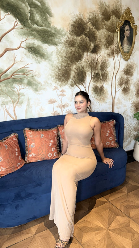 Saddle Statement Bodycon Maxi Dress In Brown - seated front shot on model - Miss Mosa By Akanksha