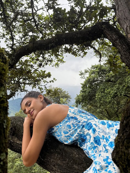 Saffron Halterneck Floral Maxi Dress In Blue - styling shot on model outdoors - Miss Mosa By Akanksha