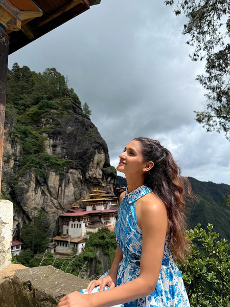 Saffron Halterneck Floral Maxi Dress In Blue - side shot on model outdoors - Miss Mosa By Akanksha