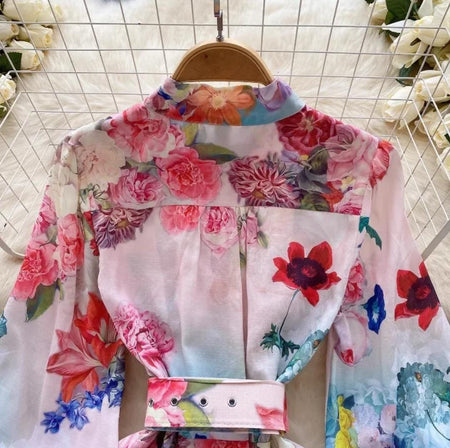 Samuel Floral Vintage Dress In Multicolour - close-up of yoke and belt detail on hanger - Miss Mosa By Akanksha