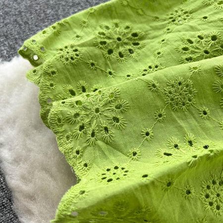 Sansa Eyelet Cotton Dress In Green - close-up of eyelet fabric detail - Miss Mosa By Akanksha