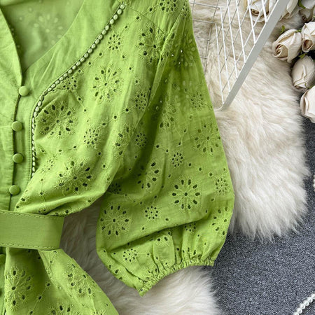 Sansa Eyelet Cotton Dress In Green - close-up of sleeve and button placket - Miss Mosa By Akanksha
